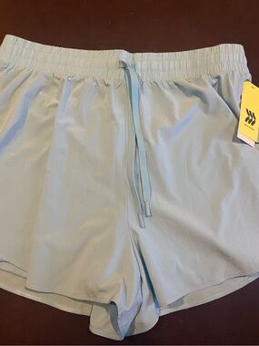 NWT All in motion light/bright blue nylon shorts with phone pocket - medium